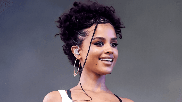 Tyla Wears Nike Total 90 Sneakers in Jamaica—See Her Signature Style
